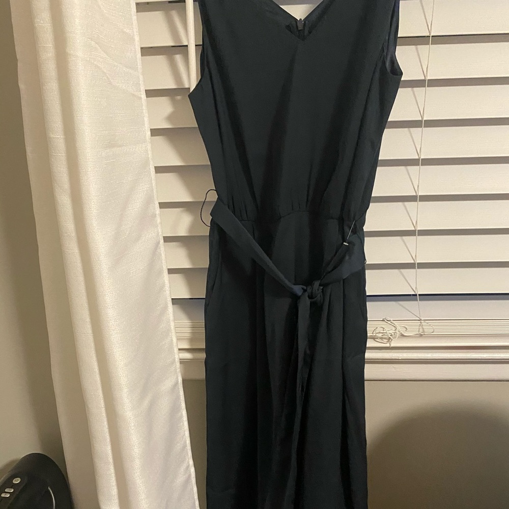 Beautiful silky emerald green romper. NWT